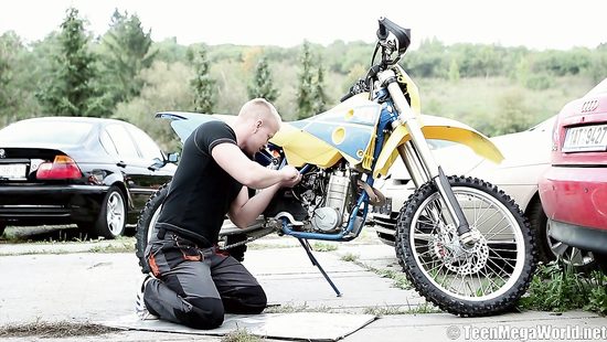 Whore rides biker's massive shaft