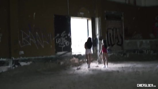 Hot brunettes film erotic threesome at an abandoned building