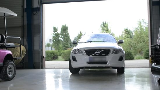 Naughty lovebirds fucking at the back of a Volvo