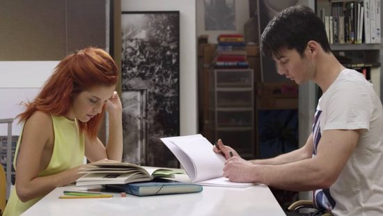 Redhead coed seduces a guy in the library