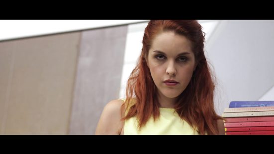 Redhead coed seduces a guy in the library