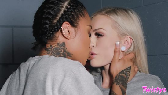 Lesbians scissoring behind the bars