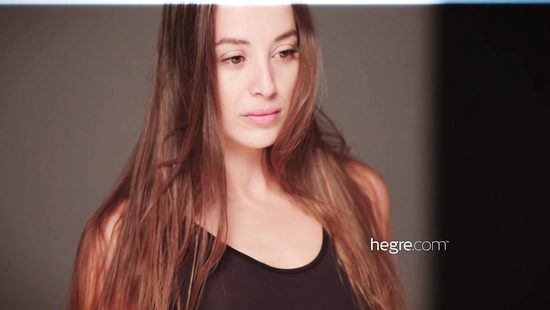 Flexible girl on naked photoshoot