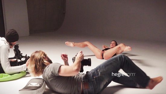 Flexible girl on naked photoshoot