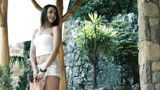 Brunette gives footjob as foreplay