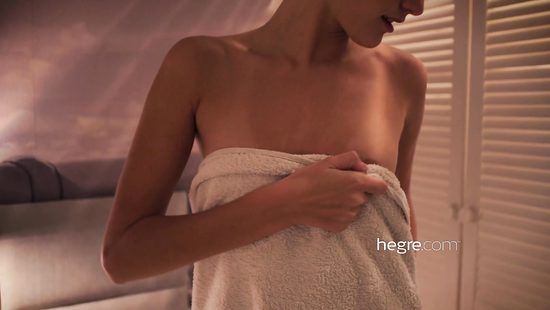 Charming blonde is getting naked