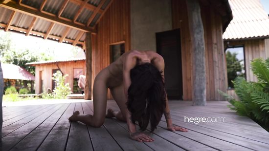 Uliana poses naked outdoors