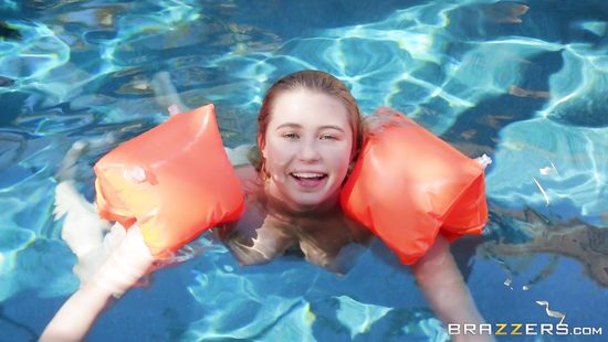 Interracial lesbian couple cannoodling outdoors