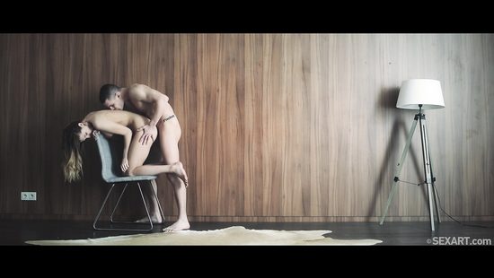 Kinky couple doing it on a comfortable chair