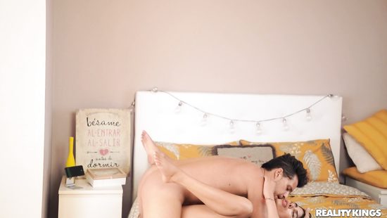 Tanned chick in a bikini likes to swallow