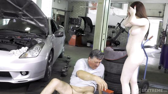 Naked teen fucks and swallows in a garage