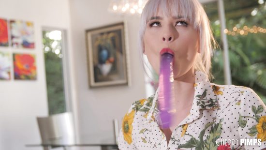 Satisfying herself with a dildo toy