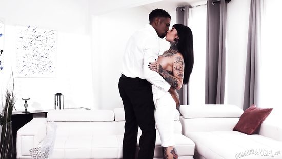 Interracial sex with a tattooed babe