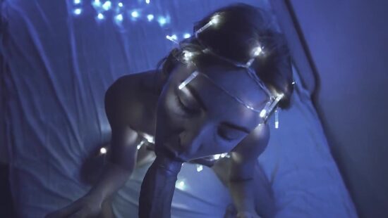 Babe wrapped in Christmas decorations