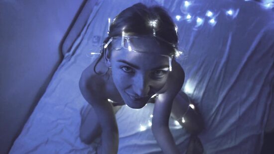 Babe wrapped in Christmas decorations