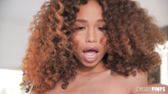 Spicy ebony touches her pussy