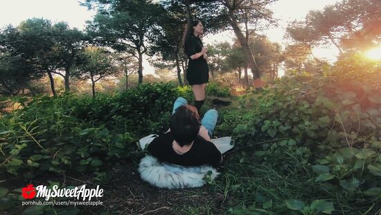 Girlfriend throats cock in the woods