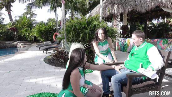 Three slutty cheerleaders share a hard cock