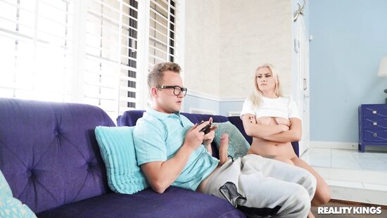 Curvaceous bimbo fucks two lucky guys