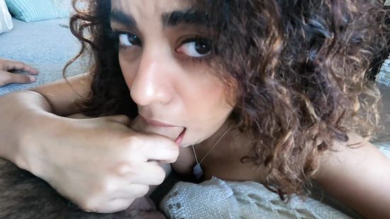 Curly-haired girl sucks well