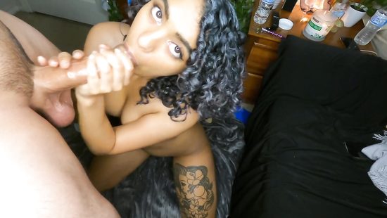 Curly-haired girl gives handjob