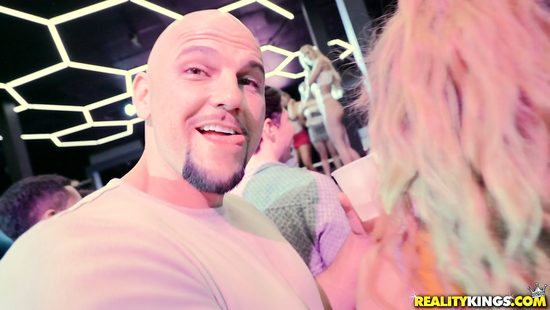 Kinky babes sharing dude in a club