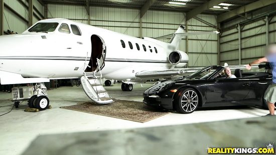 Moneyed chap having a threesome aboard private jet