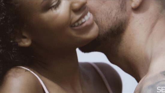 A tender act of love with a beautiful view of the mountains