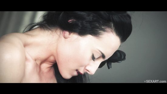 Spicy romance in bed for a classy brunette