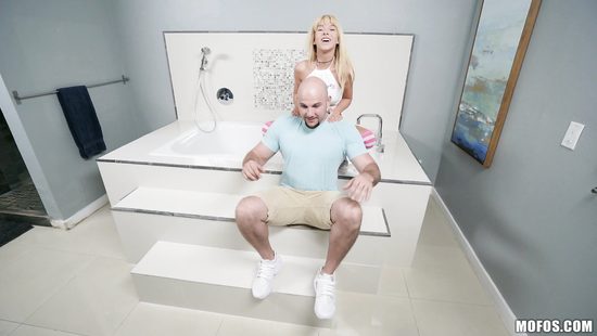 Energized blonde gets dick in the bathroom