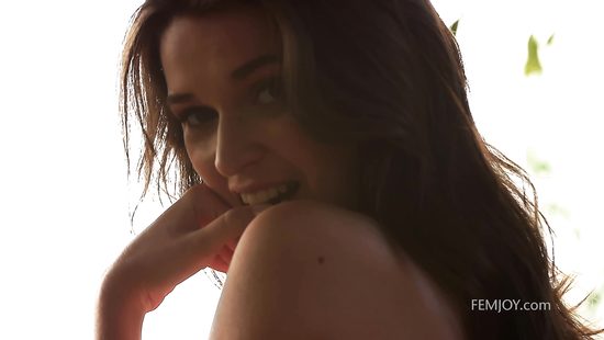 Sensual teen undresses in passionate solo