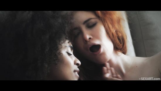 Ebony chick tempts her redhead lesbian girlfriend