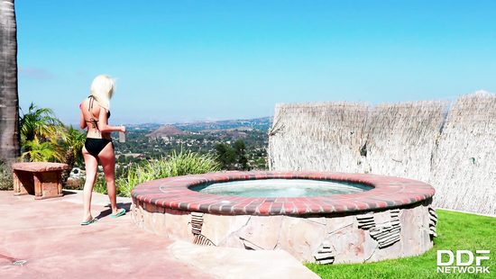Skinny blonde rubs her needy pussy on the poolside