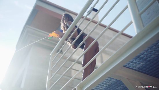 Lesbians share passionate oral by the pool