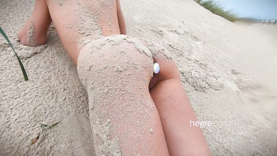 Naked Russian bitch stuffs anal with a plug