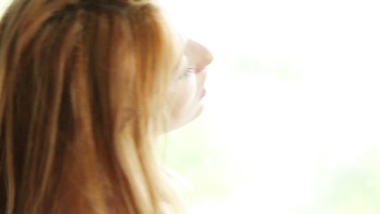 Redhead feels energized when posing hot