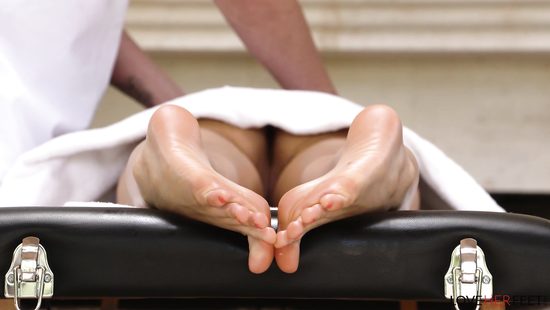 Crazy fetishist enjoys a footjob and cums on sexy toes