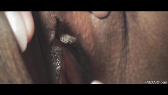 Ebony girl explores pussy of her redhead GF in closeup