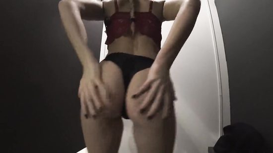 Leggy babe enjoys sex in a changing room of a shop