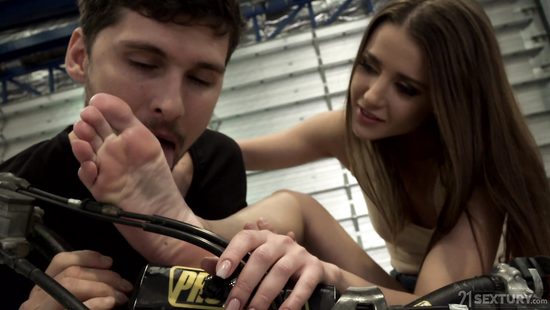 Horny biker fucks a glamorous babe in a garage