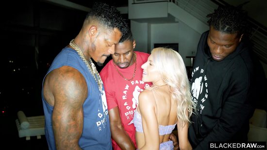 Three black fellows give a blonde a hard time