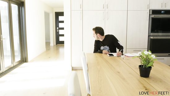 Reagan Foxx jerks off cock with her sexy toes