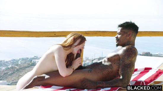 Skinny redhead gets pussy hammered by a black guy