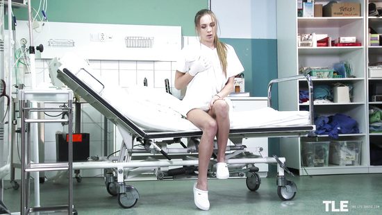 Skinny nurse masturbates with a toy and moans